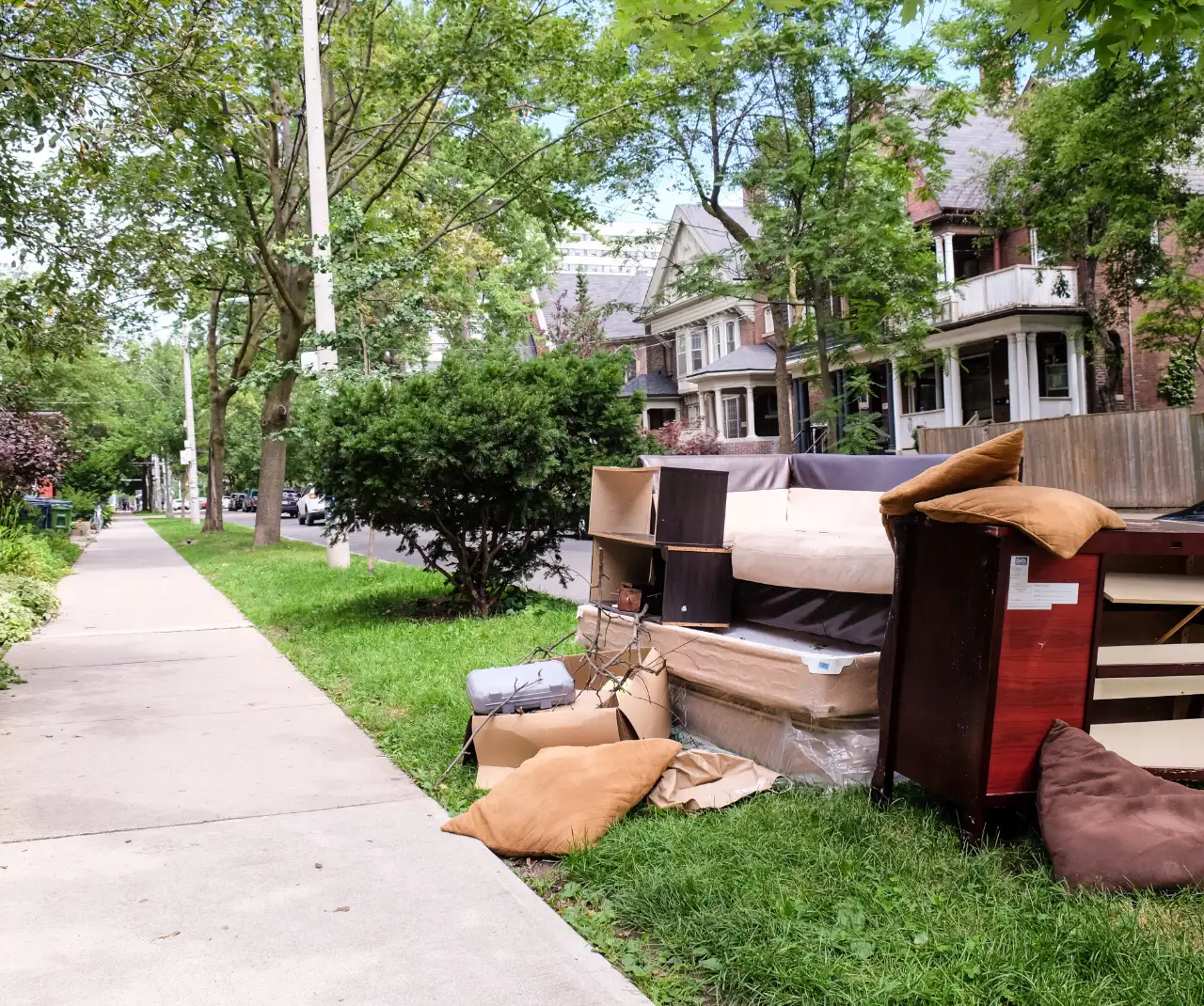 Junk removal truck being loaded in Connecticut by Pomito Junk Removal
